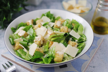 A bowl with classic Caesar salad