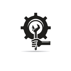 hand holding wrench and gear icon on white background