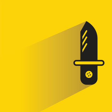 knife icon with shadow on yellow background