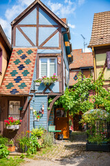 Colorful houses line the streets of Alsace France in Beautiful Village 