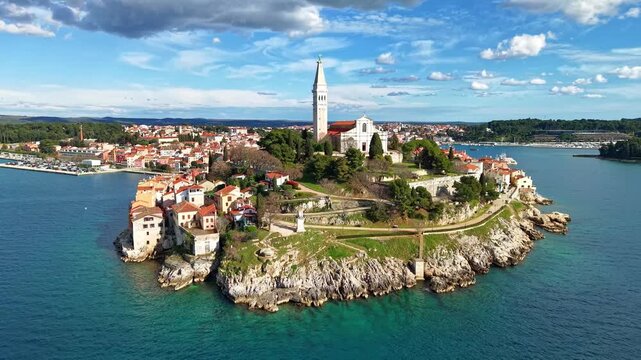 Rovinj, Croatia. Aerial view of old town and church under cloudy sky