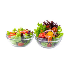Fresh vibrant salad in a glass bowl, bursting with crisp lettuce, juicy tomatoes, and healthy green vegetables, ready for a delicious vegetarian meal