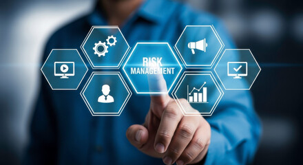 Man Touching Risk Management Icon on a Digital Interface with Hexagons