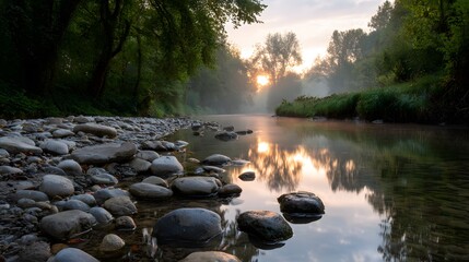 Sunlit riverbank with smooth pebbles and lush greenery at golden hour – tranquil nature scene with reflective water and serene forest glow