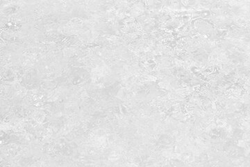 Obraz premium White water with ripples on the surface. Defocus blurred transparent white colored clear calm water surface texture with splashes and bubbles. Water waves with shining pattern texture background.