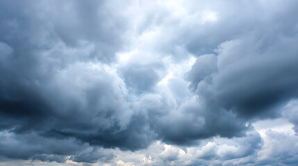 Dramatic overcast sky filled with dense, gray clouds, creating a moody atmosphere. Perfect for showcasing nature's power.