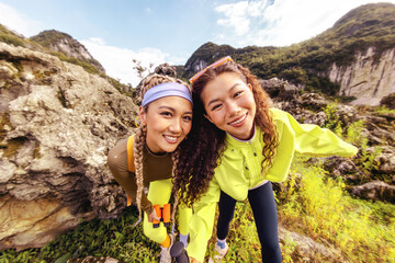 Two young women enjoying outdoor adventure together.