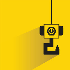 hoist crane hook icon with shadow on yellow background