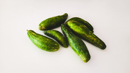 Fresh Organic Cucumbers on White Background