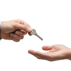 close-up of one person handing over a silver key to another hand isolated on white background for homeownership and rental concepts