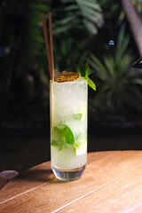 mojito cocktail on wooden table