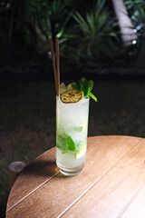 mojito cocktail on wooden table