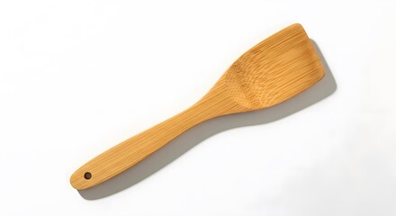 Natural Bamboo Kitchen Utensil Spatula on a Clean White Background.