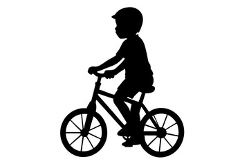 Fototapeta premium Silhouette of a Boy Riding a Bicycle, Wearing a Helmet