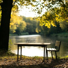 Naklejka premium Riverside Table and Chair Golden Autumn Leaves, Tranquility , Nature