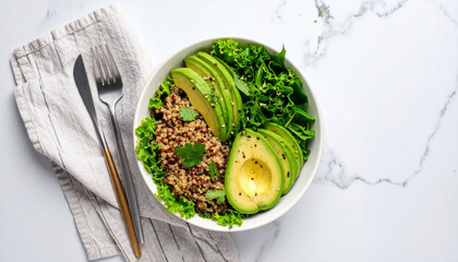 Healthy Vegan Lunch Bowl with Avocado and Quinoa on White Marble Table – Top View