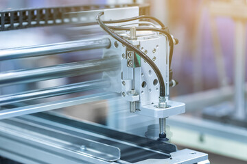 Automatic robot in assembly line working in factory. Smart factory industry 4.0 concept.