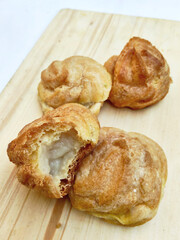 Golden Cream Puffs with Exposed Filling