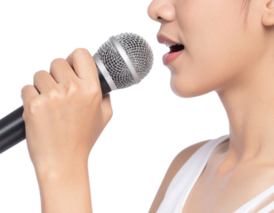 A close-up of a person holding a microphone near their mouth, preparing to speak or sing against a black background.