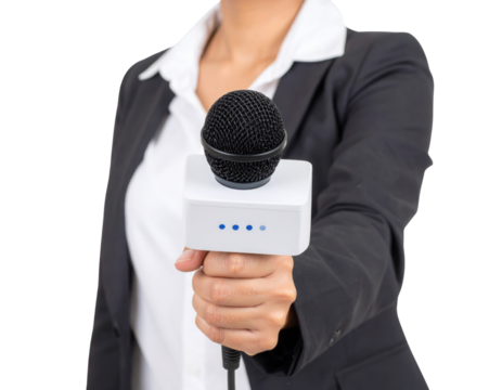 A person in business attire holds a microphone with a white square mic flag, extending it forward as if conducting an interview.