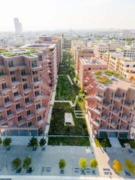 Aerial view of the The Paris 2024 Olympic and Paralympic Village flanking a vibrant green space in Village des Athl&Atilde;&uml;tes Olympiques, Saint-Ouen-sur-Seine, &Atilde;Žle-de-France, France.