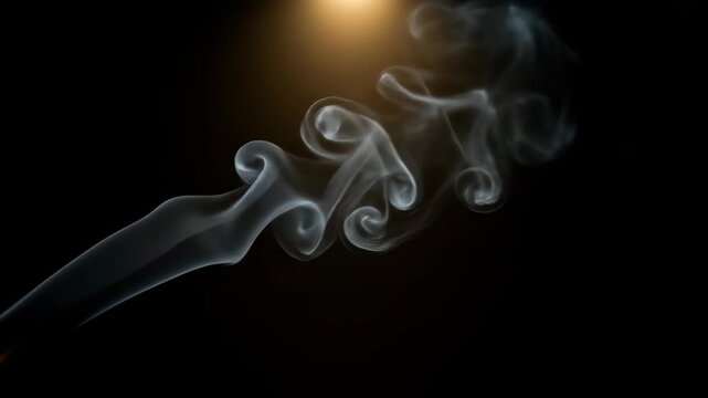 Wisps of white smoke gracefully dance and swirl against a dark background, illuminated by a golden light, creating an ethereal and mesmerizing abstract pattern 8k wallpaper