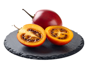 Two whole and two halves of vibrant, exotic fruits, displayed on a dark grey stone plate, against a black background. The fruits exhibit a rich color palette of deep red and orange, with visible