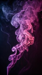 Obraz premium Wisps of colorful smoke in shades of pink and blue against a dark background