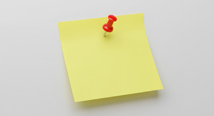Red Pushpin Securing Yellow Sticky Note on a Light Surface