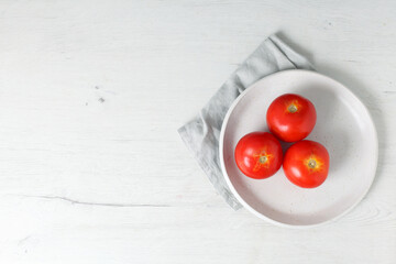 Dish of garden tomatoes