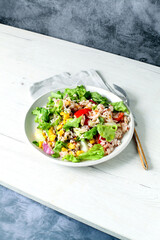 Rice salad with corn and tomato