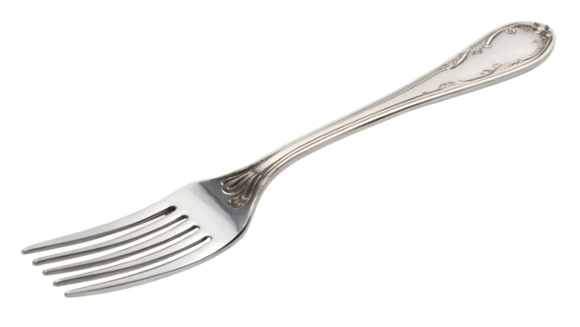 A beautiful silver dinner fork with elegant decorative patterns lies diagonally, perfectly isolated on a transparent background, a clean png image.