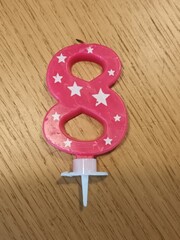 Pink Number Eight Birthday Candle with Stars
