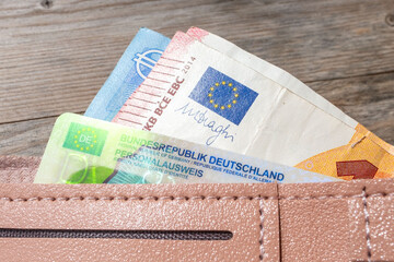 German ID card in brown leather wallet with EU flag, Modern European personal document, European...