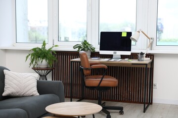 Fototapeta premium Stylish workplace with modern computer on wooden desk