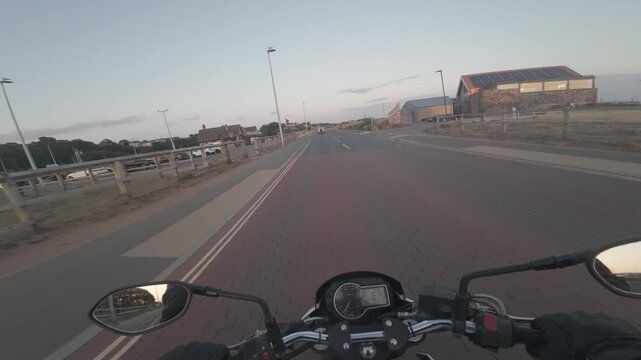 Motorbike Riding at Sunset on the Beach