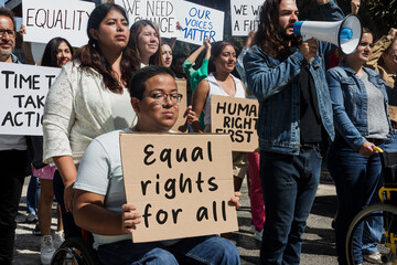 Group of Latin people activists protesting on streets for Human Rights in Mexico Latin America, Hispanic women and men together in a meeting for peace and equality