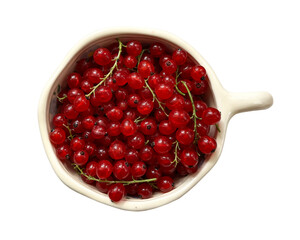 A cup with red currants. Isolated on a white background.