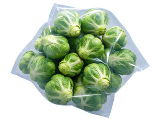 Fototapeta premium Brussels Sprouts (Brassica oleracea) Fresh Brussels sprouts wrapped in clear plastic. The small, tight green buds are visible through