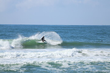 Stand‑Up Paddleboarding on Ocean Waves at Balne&aacute;rio Cambori&uacute; Beach