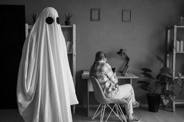 Life and death. Concept of afterlife and memory for lost love. woman sitting on chair using...