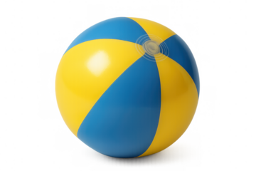 Yellow beach ball spinning, transparent background showcasing vibrant summer recreational accessory