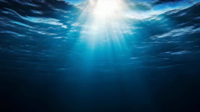 Underwater View with Sun Rays Penetrating the Ocean Surface