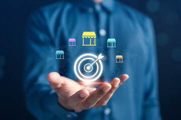 Franchise business expansion strategy concept. Target marketing, brand growth, retail development, and global store network planning shown with hand and icons. Perfect for business solutions.