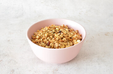 Granola in a Pink Bowl A Healthy Breakfast Option