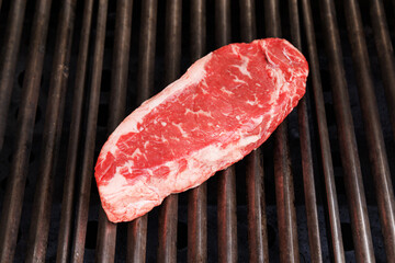Juicy steak on a grill