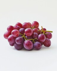 Fototapeta premium A cluster of fresh, plump red grapes with a glossy sheen against a light background.