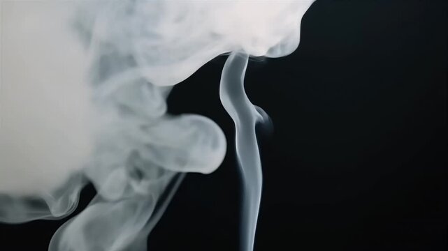 Wisps elegant grey cigar smoke rise ultra slow motion against true black captured vertically pin sharp K smartphone stories graceful twists invite composers to overlay logos lyrics perfume bottles