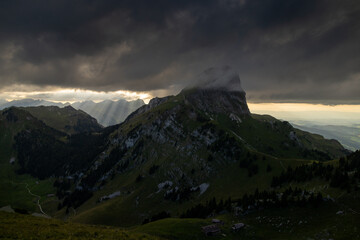 Dramatic Swiss Alps Landscape with Stockhorn and Sunlight Rays