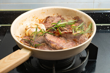 cooking beef at home at horizontal composition